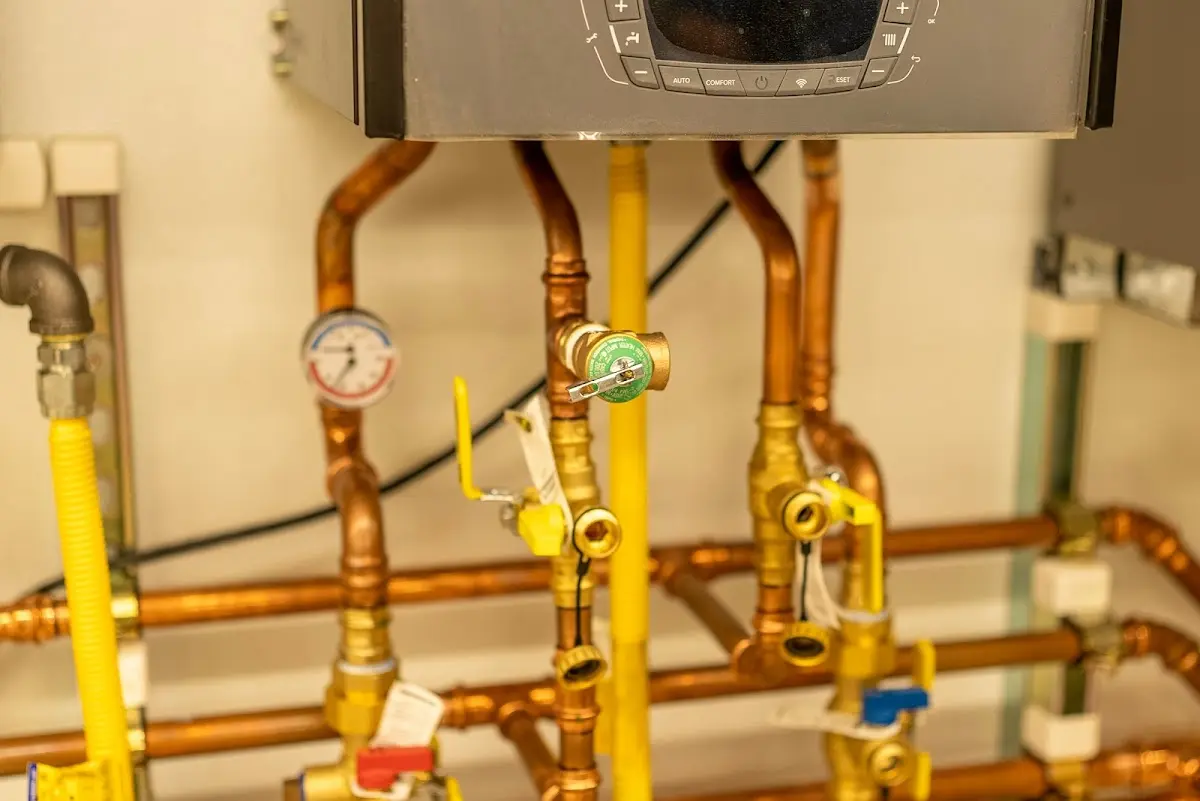 Licensed technician providing Water Heater Installation for a homeowner in Pittsboro